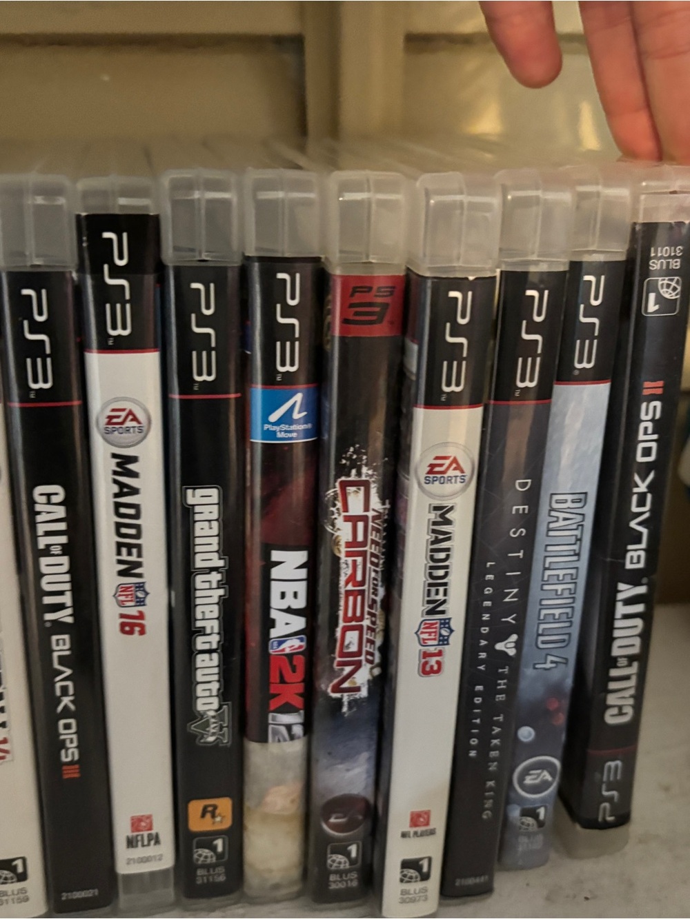 Sony PS3 Game Lot in Black, White, Red, Blue Spines